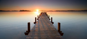 Germany, Bavaria, Wörthersee (lake), footbridge at sunrise Germany, Bavaria, Wörthersee (lake), footbridge at sunrise